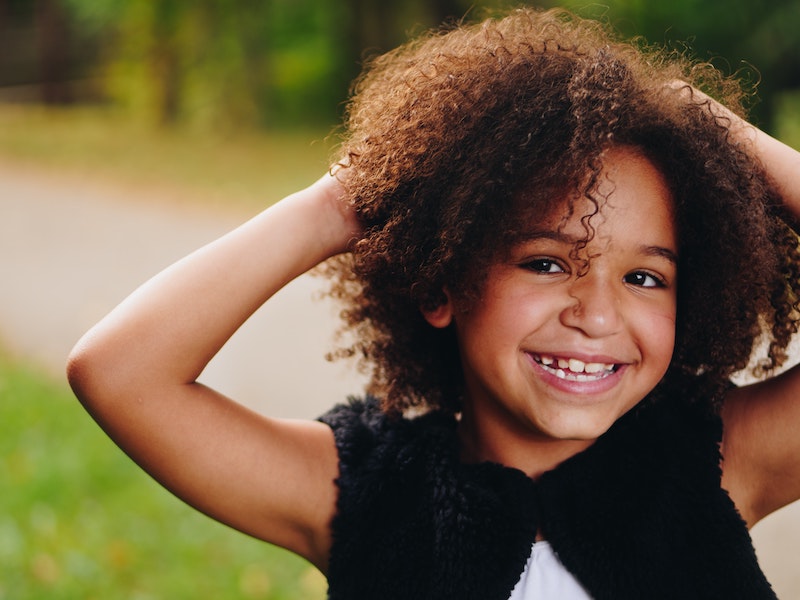 beautiful-black-girl-smiling-eye-for-ebony-unsplash